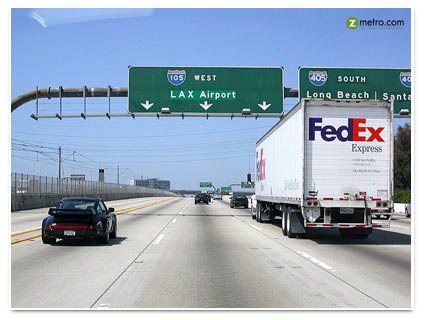 Porsche Turbo, FedEx Truck, the I-105 Westbound, LAX via www.zmetro.com