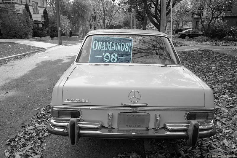 A Madison street scene Obamanos 2008 in a classic Mercedes 280SE